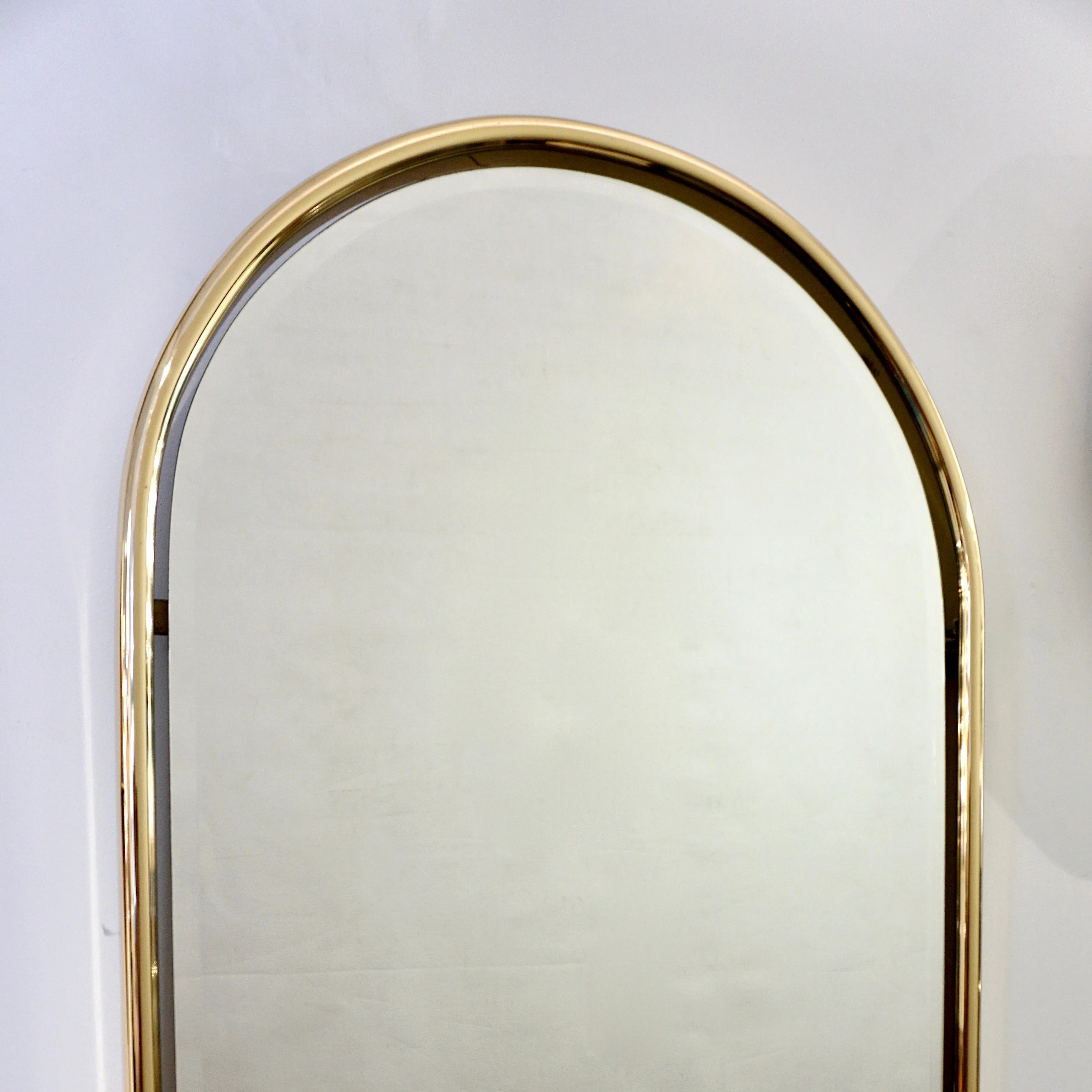 1960s Italian Minimalist Brass Full Floating Mirror with Round Arched Top Frame
